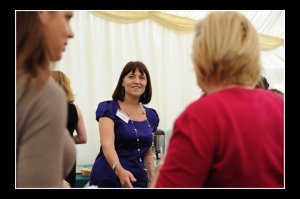Business Woman at The Business Womans Network shaking hands